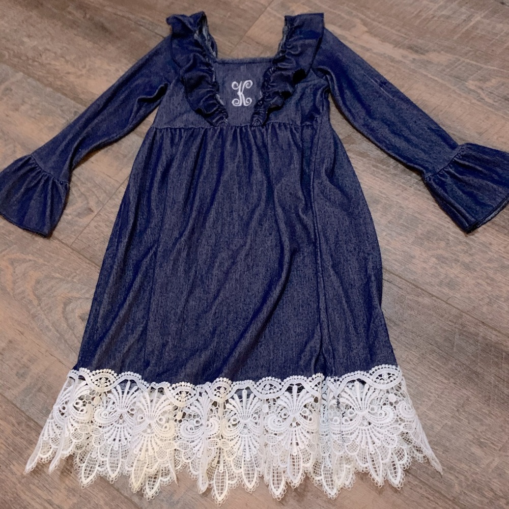Dress with “K” monogram on chest